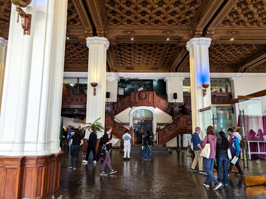 The Wild, Citywide Scavenger Hunt That Ate San Francisco 3 Pursuit players start to file into the lobby of the Don Lee building at 1000 Van Ness Avenue in San Francisco. Wednesday August 13 2025 eZAXvW