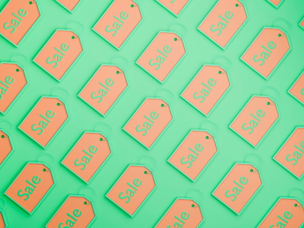 Sale tags discount green orange GettyImages 1349824744 Hector Roqueta Rivero cropped pgtcFw