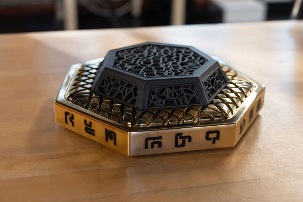 Extropic Aims to Disrupt the Data Center Bonanza 2 brass on wood 2 lQobFq